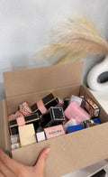 CAJA 50 MINI PERFUMES